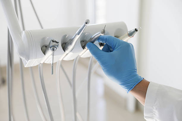 Professional Emergency Dentist technician working in St. John, MO